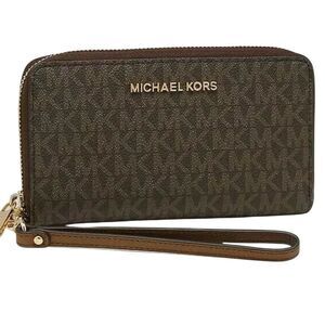 MICHAEL KORS JET SET TRAVEL WALLET IN BROWN
